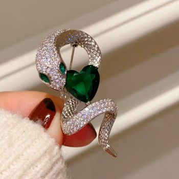 Брошка, змия